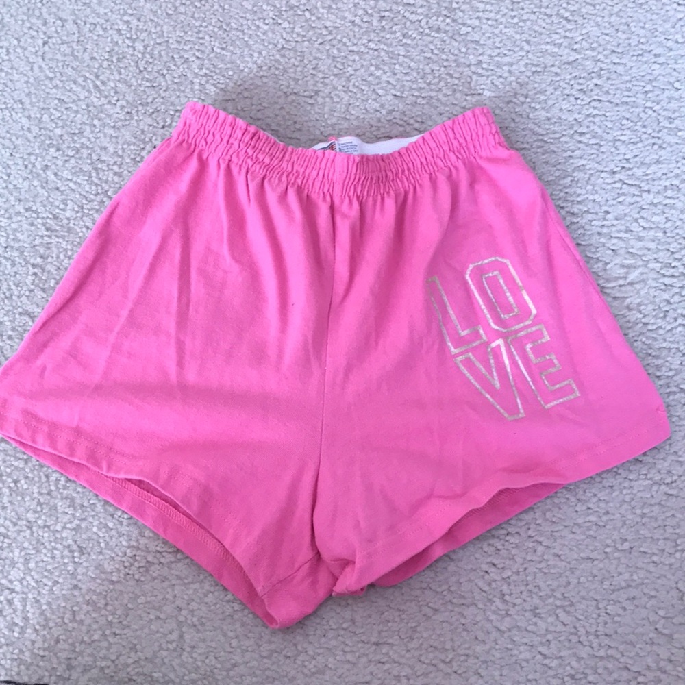 pink soffe shorts - "LOVE" gold lettering